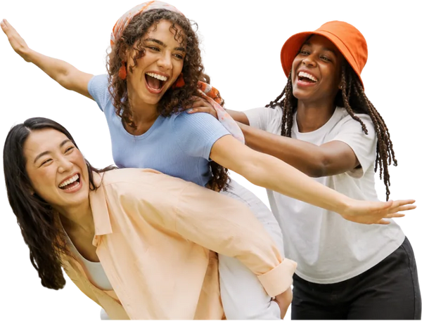 Three women laughing together